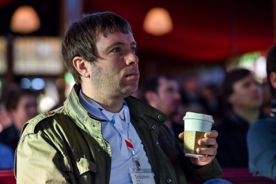 An audience member pays close attention at the Sports Summit. Ray McManus / SPORTSFILE / Web Summit